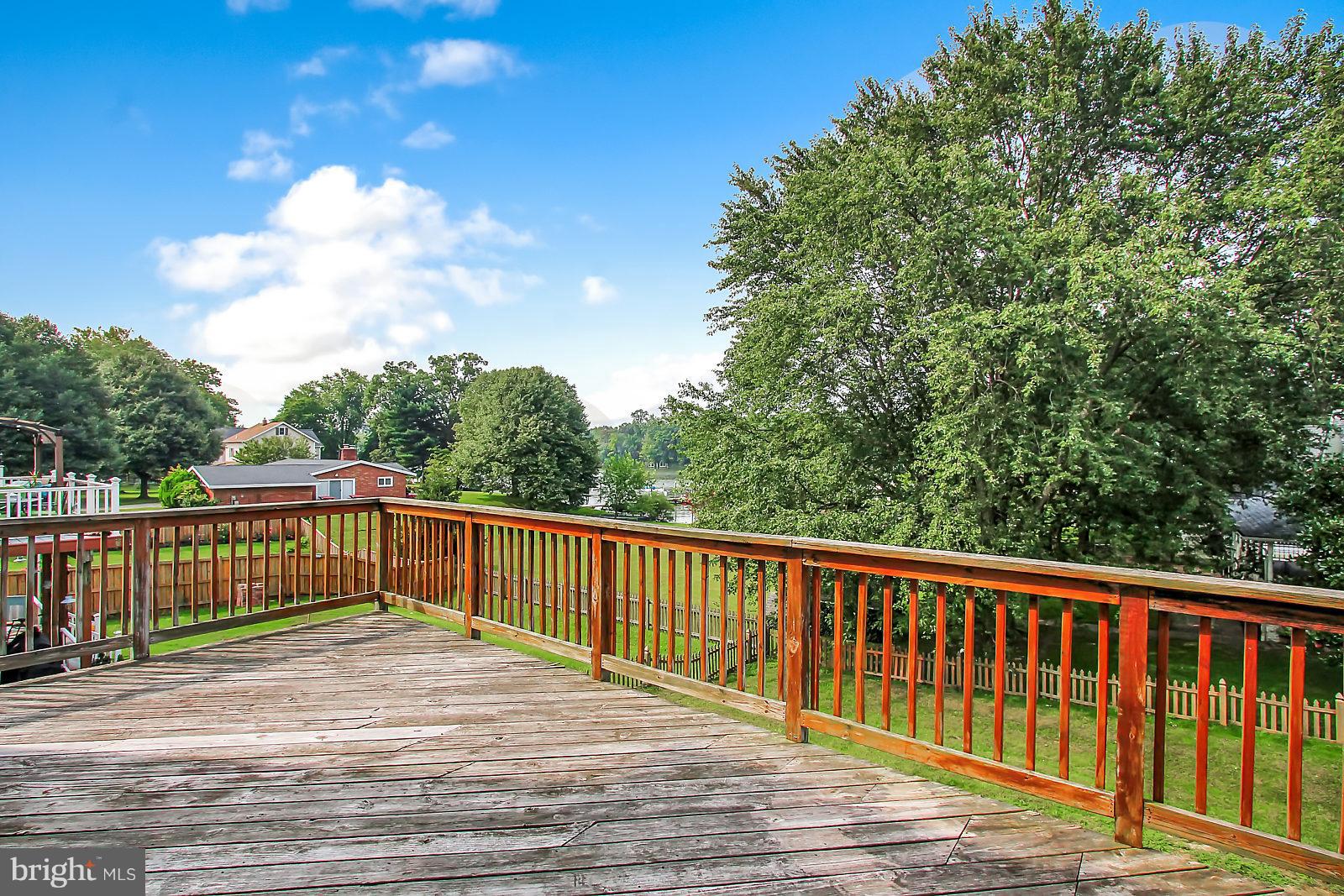 532 Grovethorn Road Baltimore, MD 21220 - Photo 25 of 30 a view of deck with two chairs and wooden fence