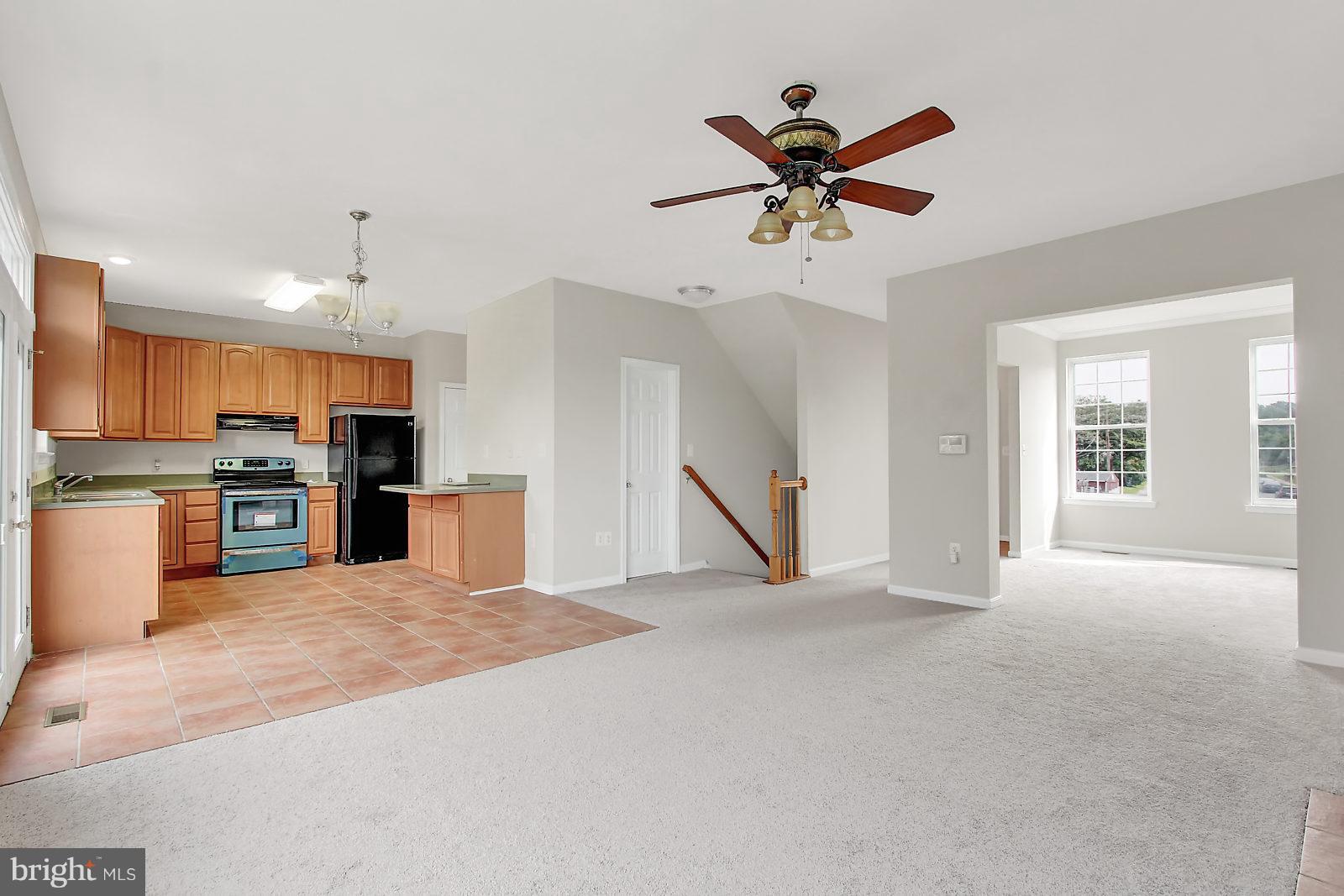 532 Grovethorn Road Baltimore, MD 21220 - Photo 7 of 30 a view of a kitchen with sink and a ceiling fan