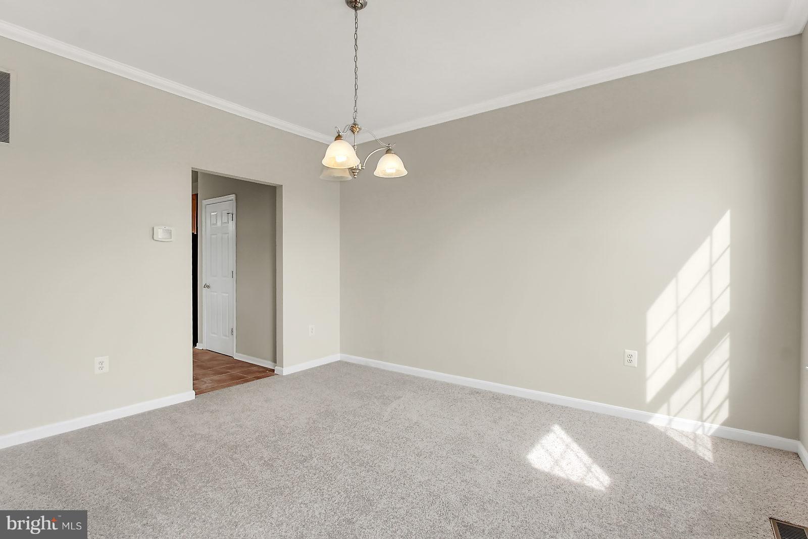 532 Grovethorn Road Baltimore, MD 21220 - Photo 10 of 30 a view of an empty room with a window
