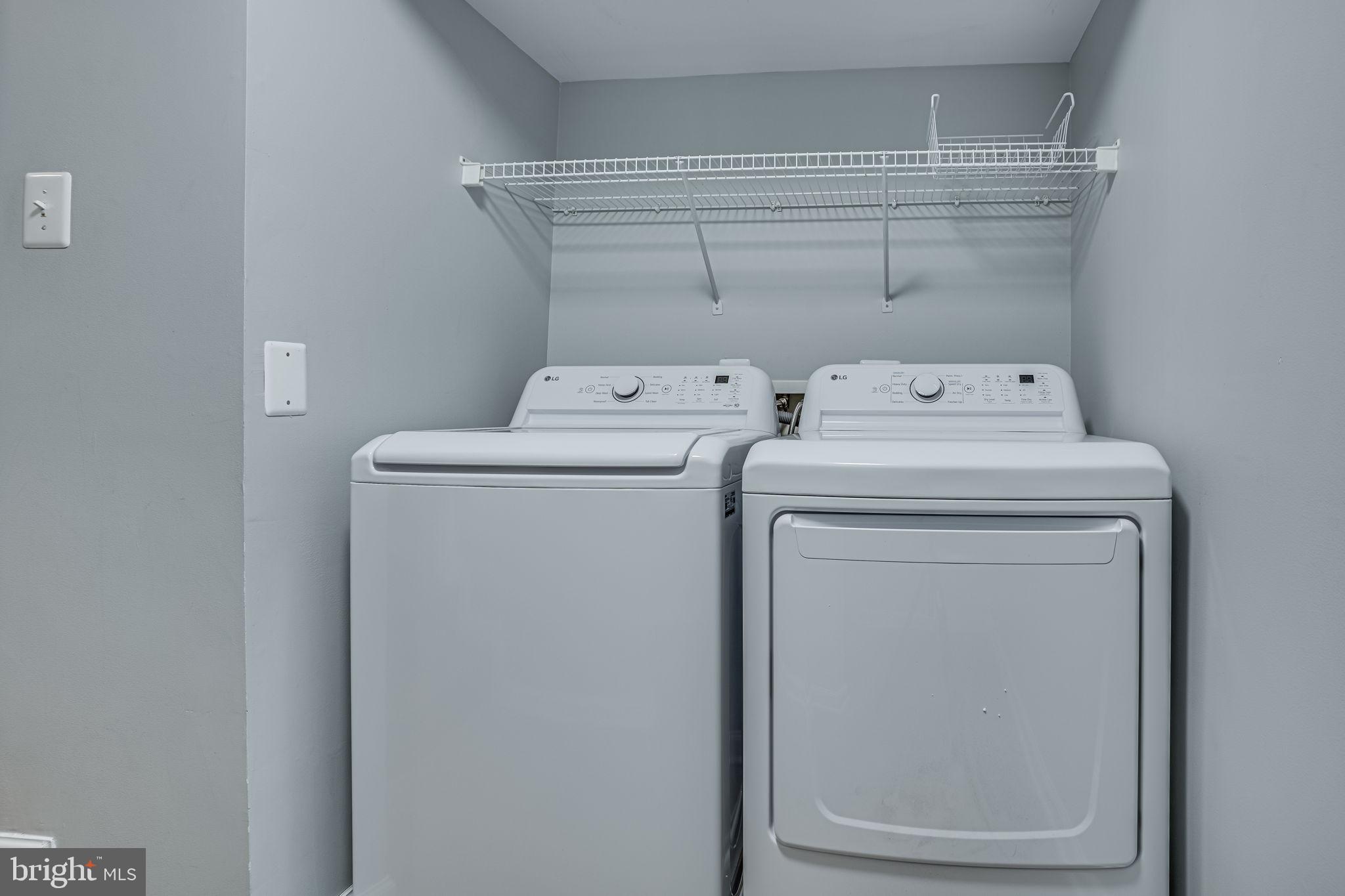 6321 Eagle Ridge Lane, Unit B Alexandria, VA 22312 - Photo 33 of 39 a utility room with dryer and washer