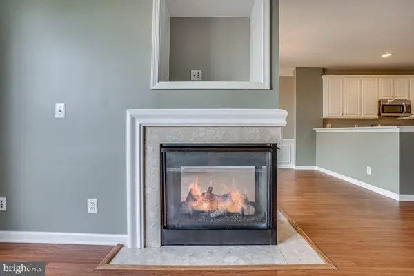 a living room with a fireplace