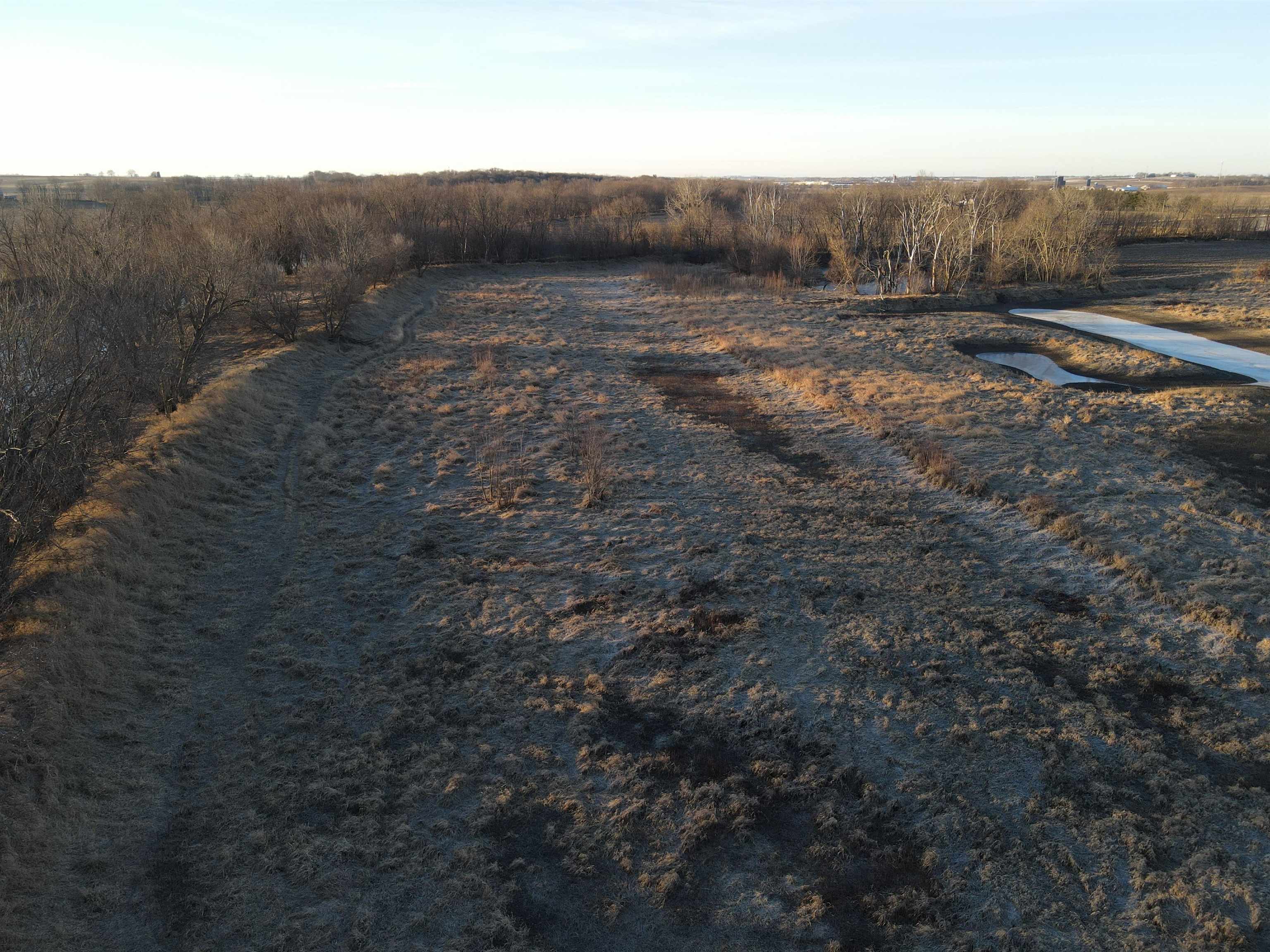 0 North Fawver Road Freeport, IL 61067 - Photo 59 of 80 a view of a dry field with trees in background