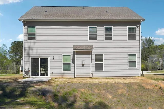 a front view of a house with a garage