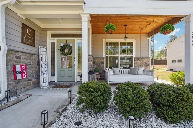 a front view of a building with outdoor seating