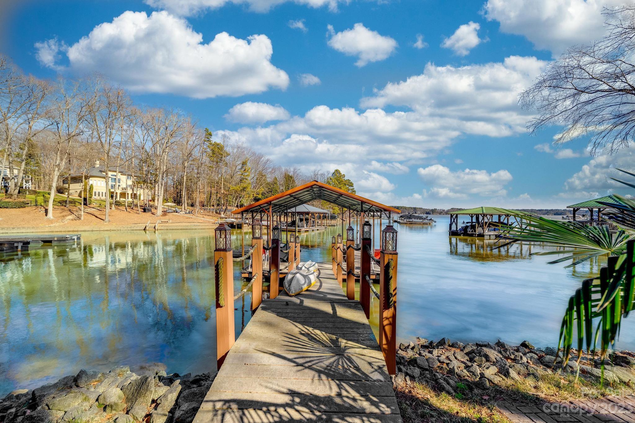8065 Bay Pointe Drive Denver, NC 28037 - Photo 36 of 40 a view of a lake with a big yard