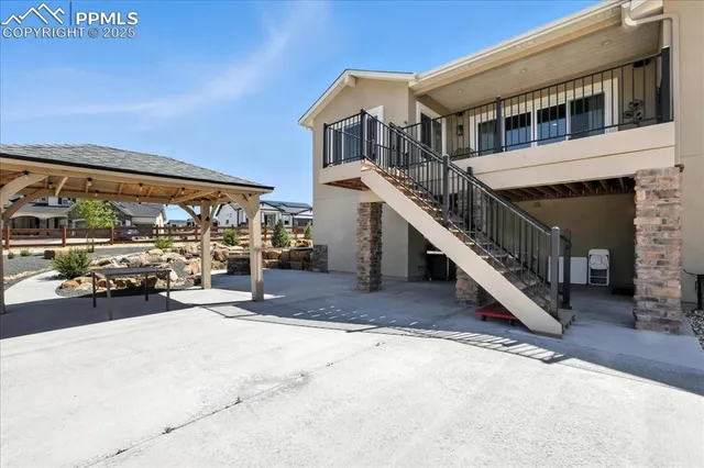 a view of house with outdoor area