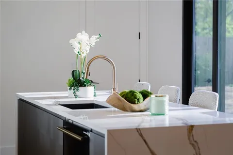a vase of flowers sitting on a table