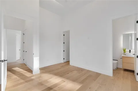 a bathroom with a shower and a toilet