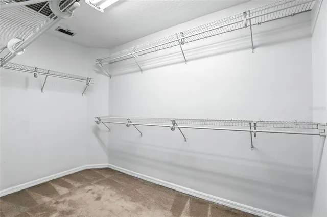 a view of a room with racks on the wall