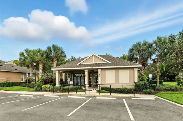 a view of a house with swimming pool