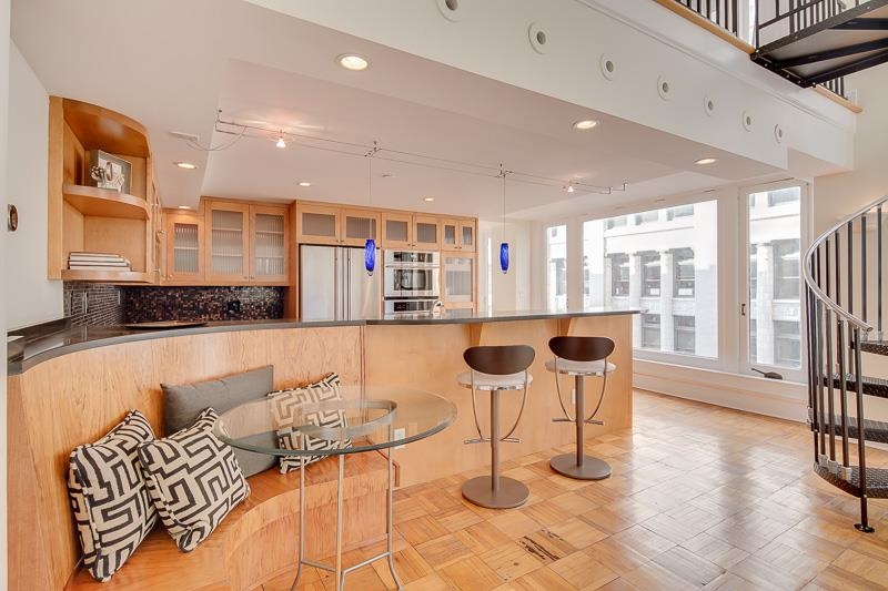 97 Monroe Avenue Memphis, TN 38103 - Photo 11 of 25 a living room with furniture and a large window