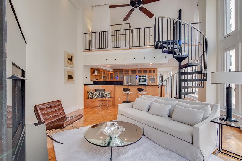 97 Monroe Avenue Memphis, TN 38103 - Photo 13 of 25 a living room with furniture and a table