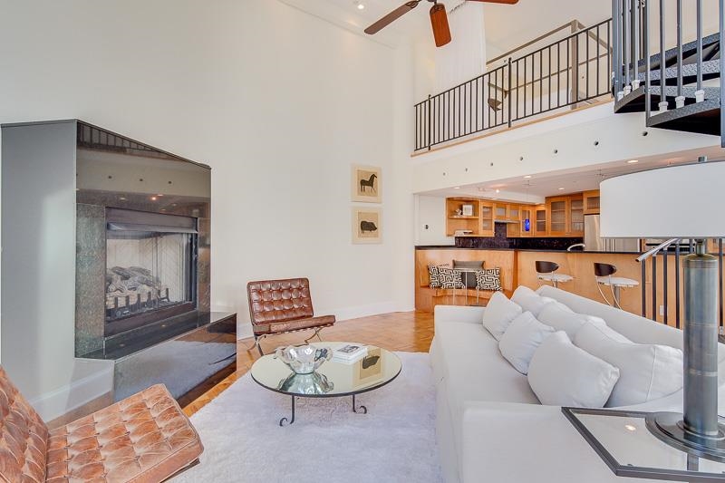97 Monroe Avenue Memphis, TN 38103 - Photo 14 of 25 a living room with furniture and a wooden floor