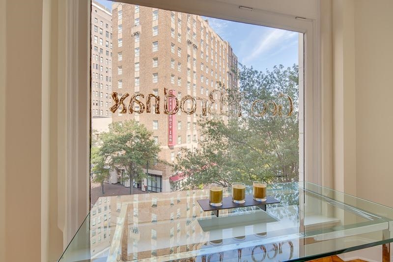 97 Monroe Avenue Memphis, TN 38103 - Photo 15 of 25 a living room with furniture and a window