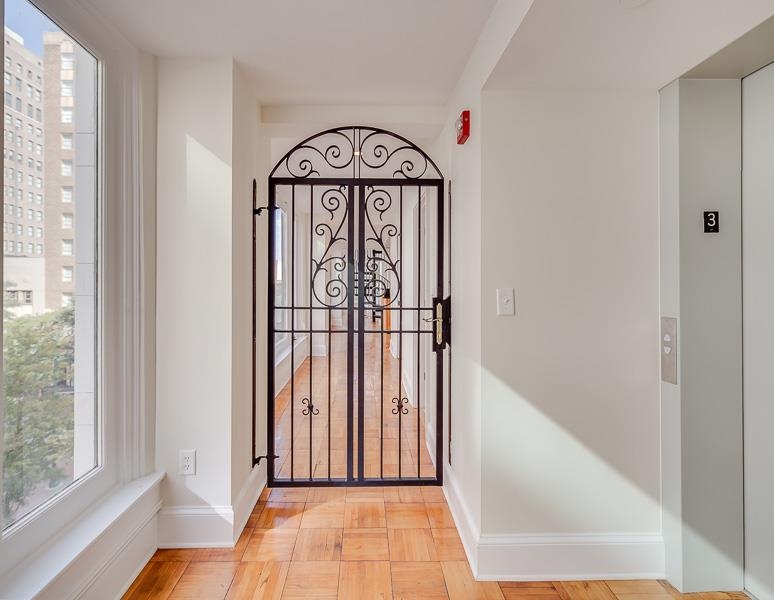97 Monroe Avenue Memphis, TN 38103 - Photo 4 of 25 a view of front door with wooden floor