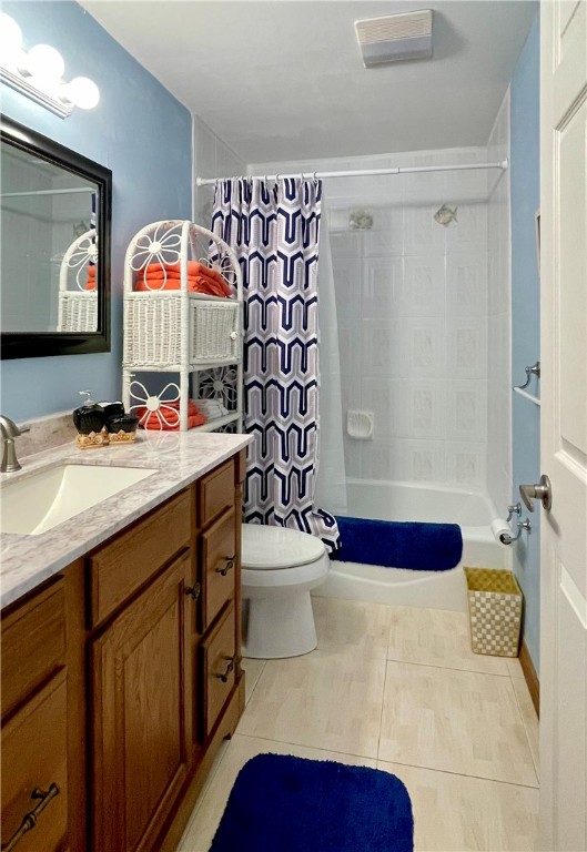 5400 A1a Highway, Unit A2 Vero Beach, FL 32963 - Photo 23 of 28 a bathroom with a sink vanity mirror and shower