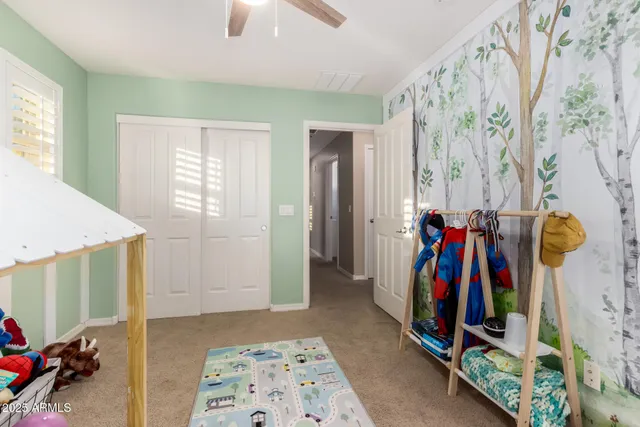 a bathroom with a sink toilet a mirror and shower