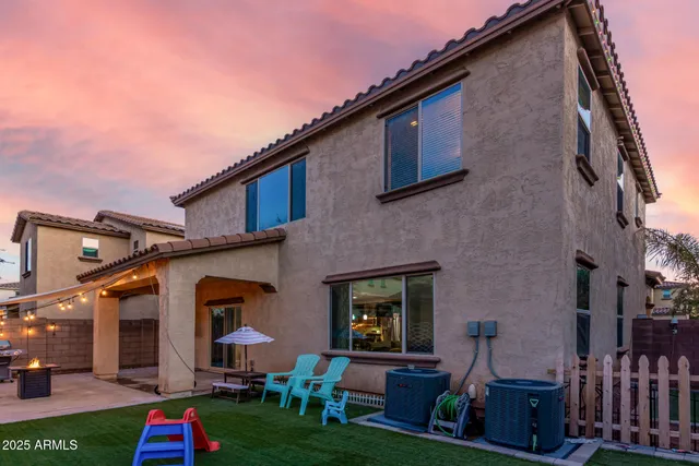a childrens park with lots of swings and slides