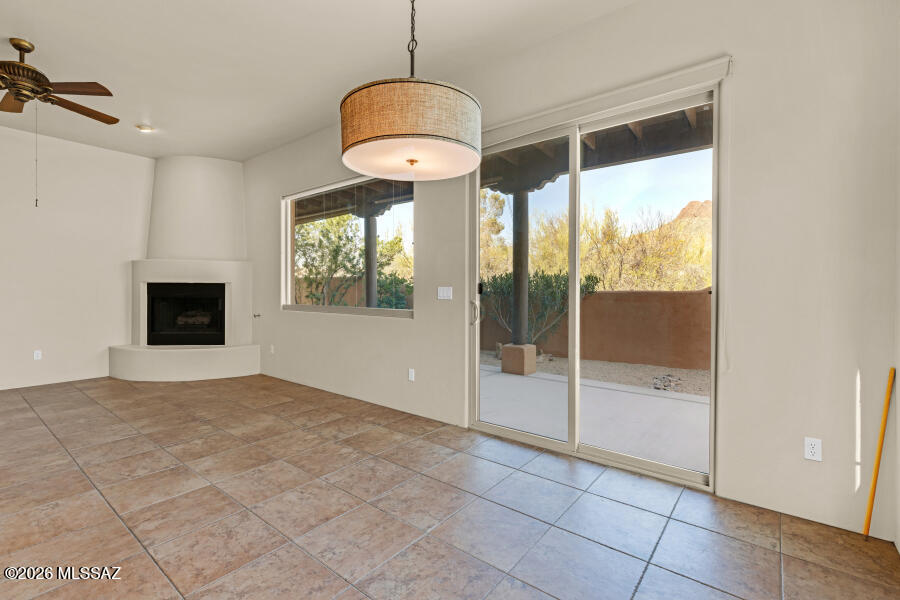 5660 Triangle X Place Tucson, AZ 85713 - Photo 15 of 48 5660 Triangle X Living Room to Rear Pati