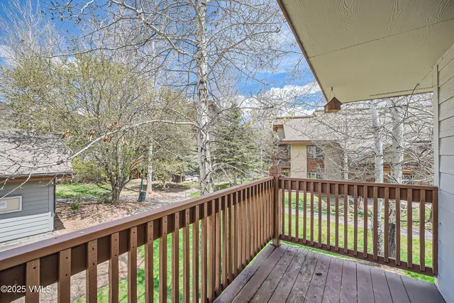 a view of a wooden roof deck