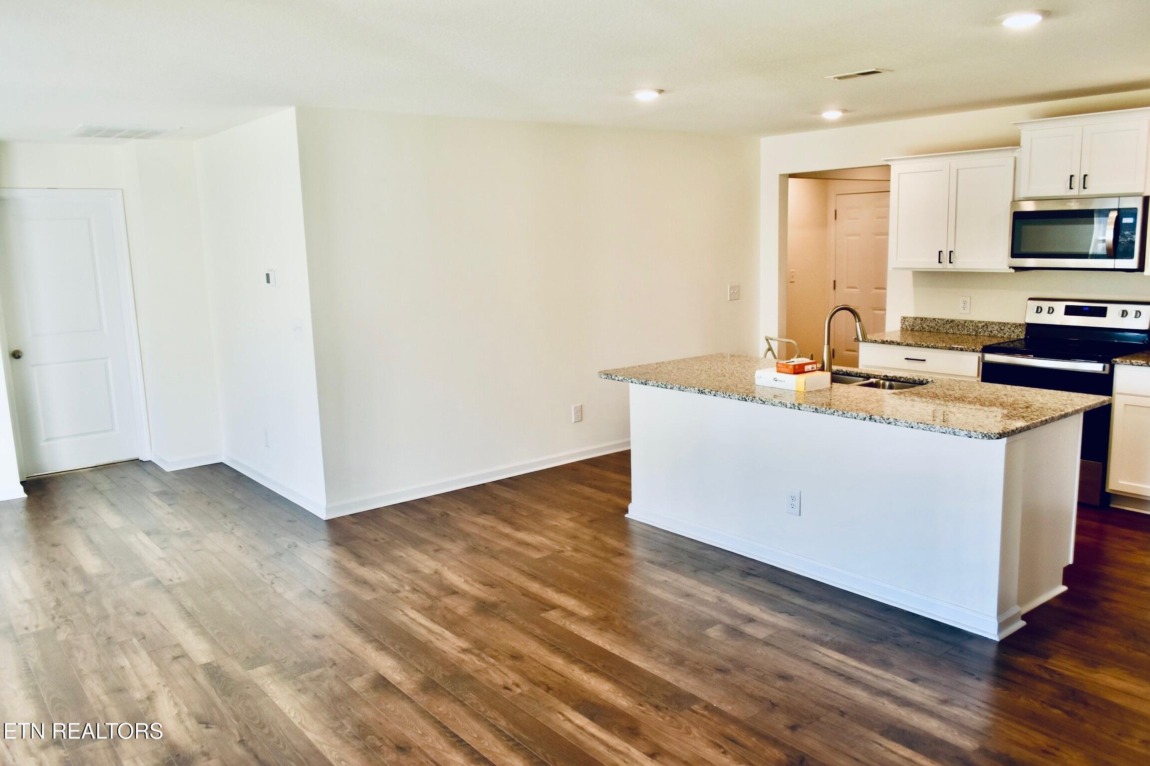 7513 Cottontail Street Corryton, TN 37721 - Photo 7 of 34 kitchen view dining room