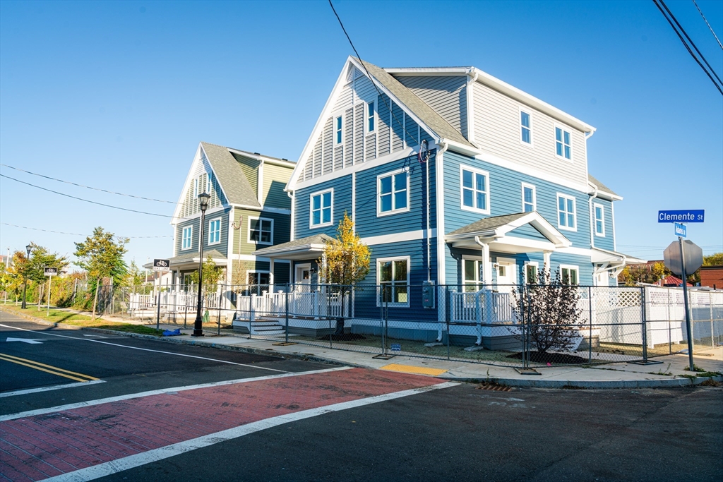 199 Clemente Street Holyoke, MA 01040 - Photo 16 of 16 a front view of a house with a yard