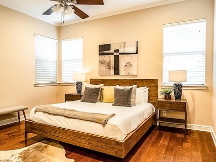 16308 Lake Loop Austin, TX 78734 - Photo 5 of 11 Bedroom with ornamental molding, dark wood-style floors, and ceiling fan