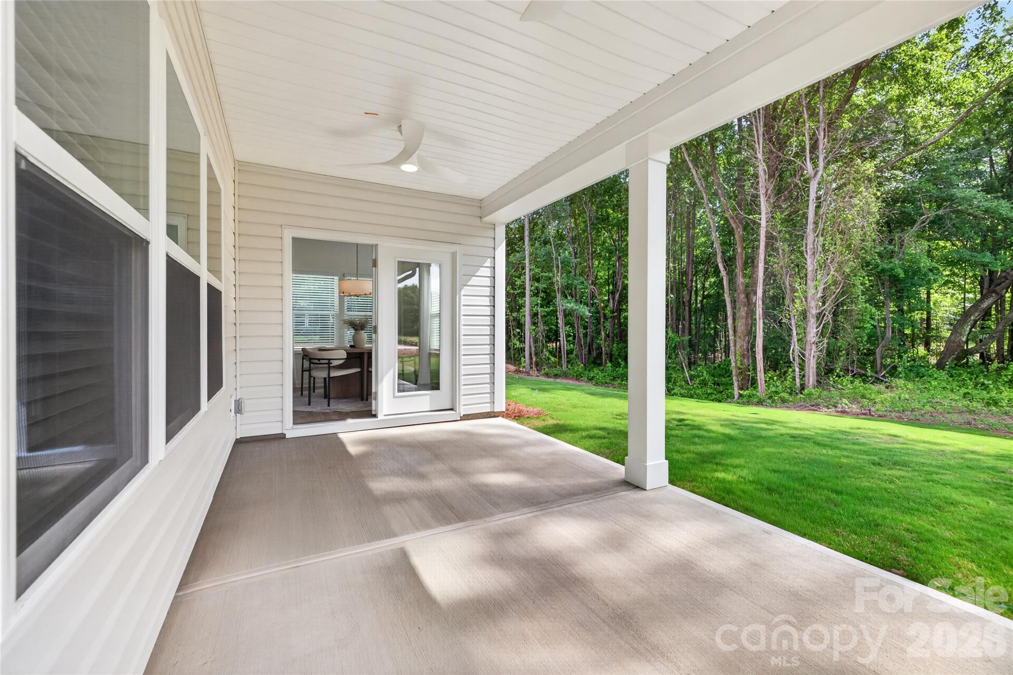 128 Overcash Road, Unit 7171 Troutman, NC 28166 - Photo 39 of 41 a view of a porch with a backyard