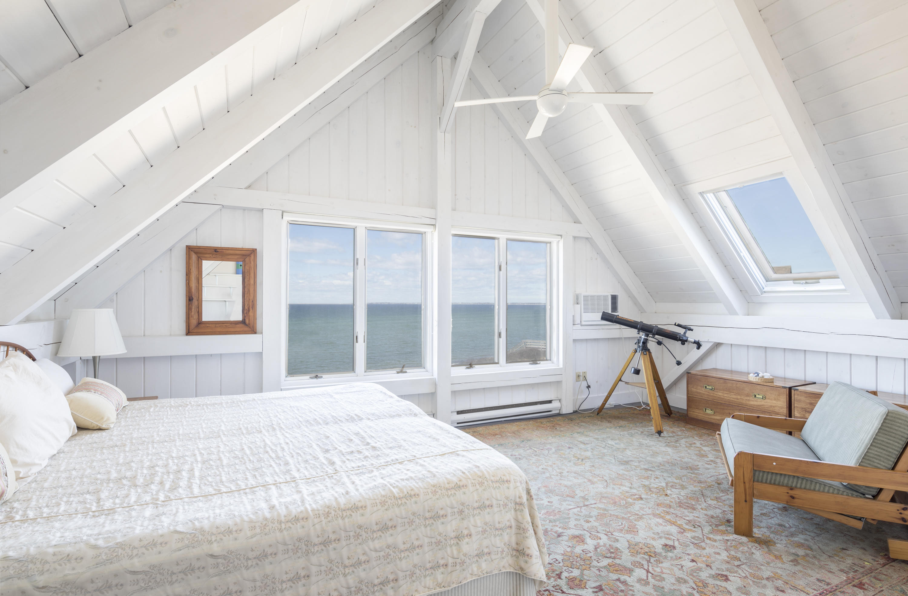 17 Bay View Road Truro, MA 02666 - Photo 16 of 40 a bedroom with a bed and a large window