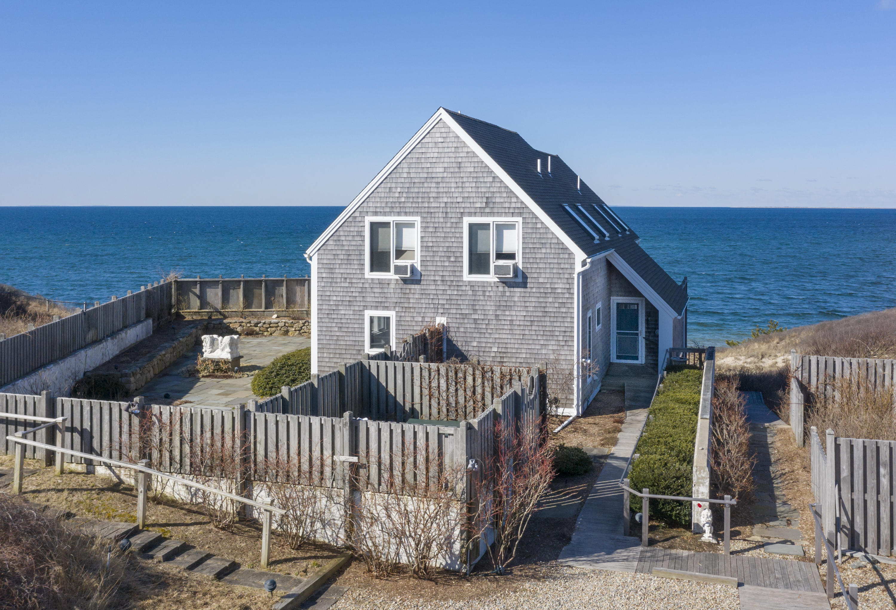 17 Bay View Road Truro, MA 02666 - Photo 2 of 40 a view of a house with wooden fence
