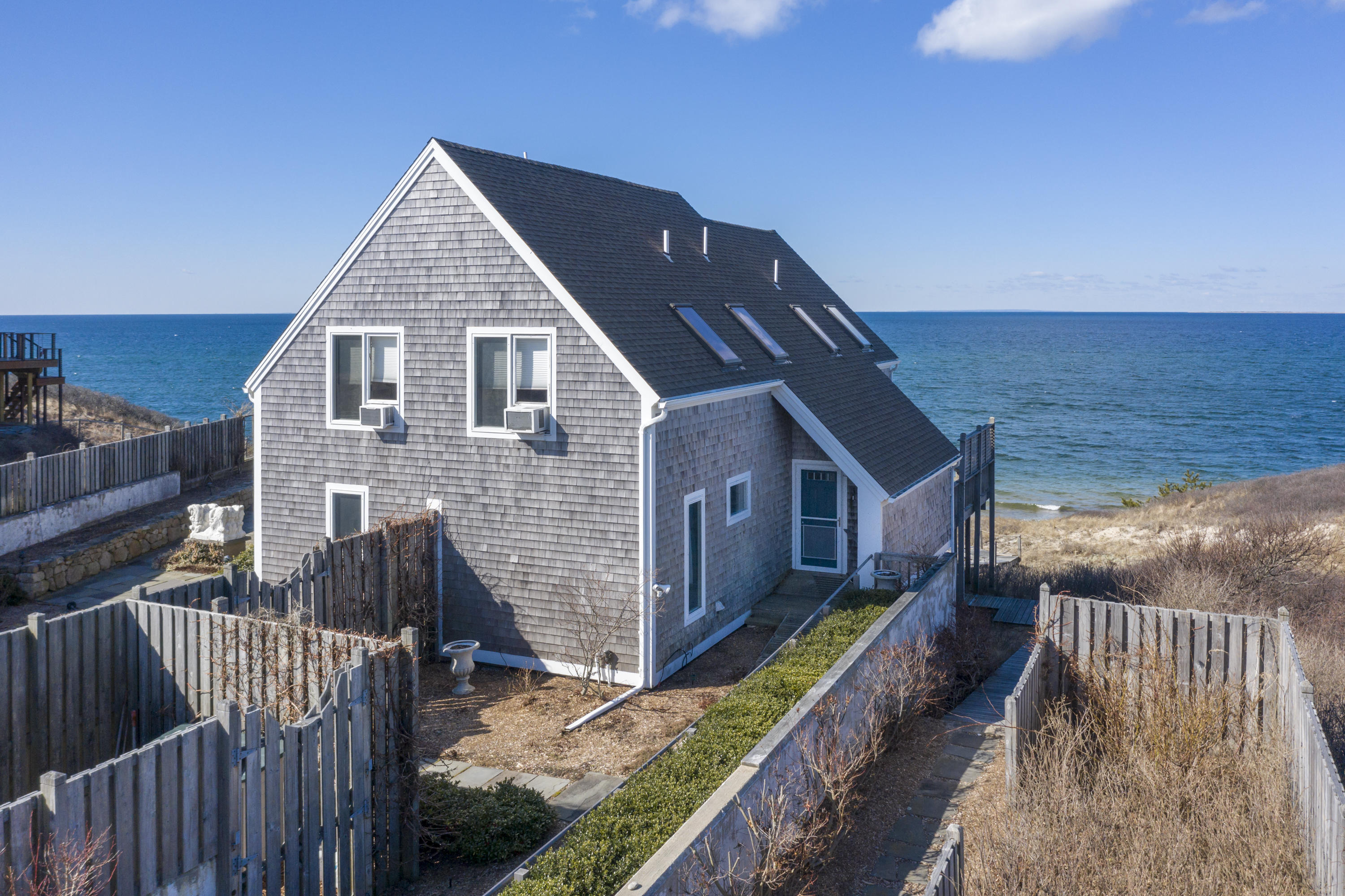 17 Bay View Road Truro, MA 02666 - Photo 33 of 40 a view of a house with wooden deck front of house