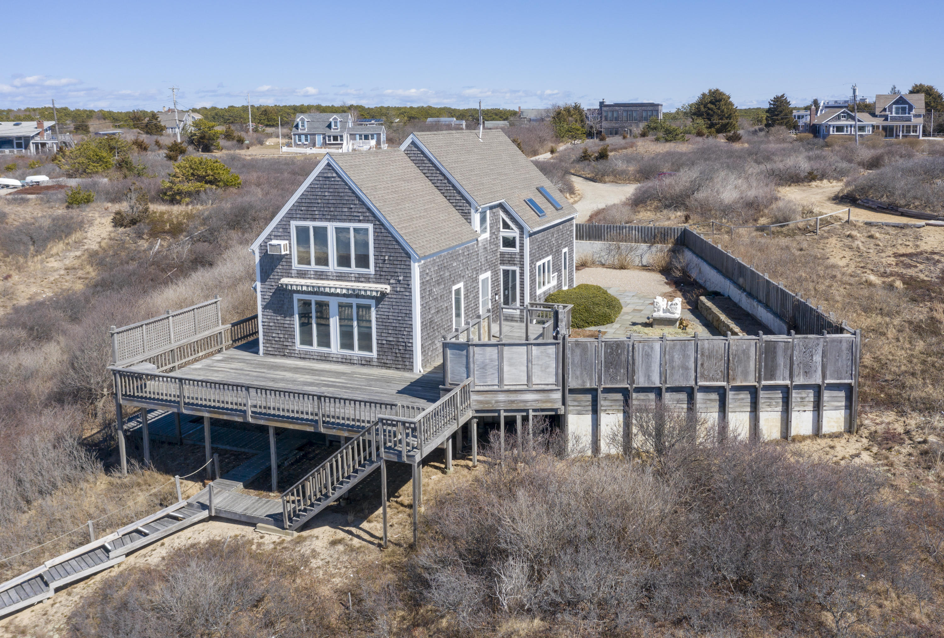 17 Bay View Road Truro, MA 02666 - Photo 4 of 40 an aerial view of residential houses with deck and city view