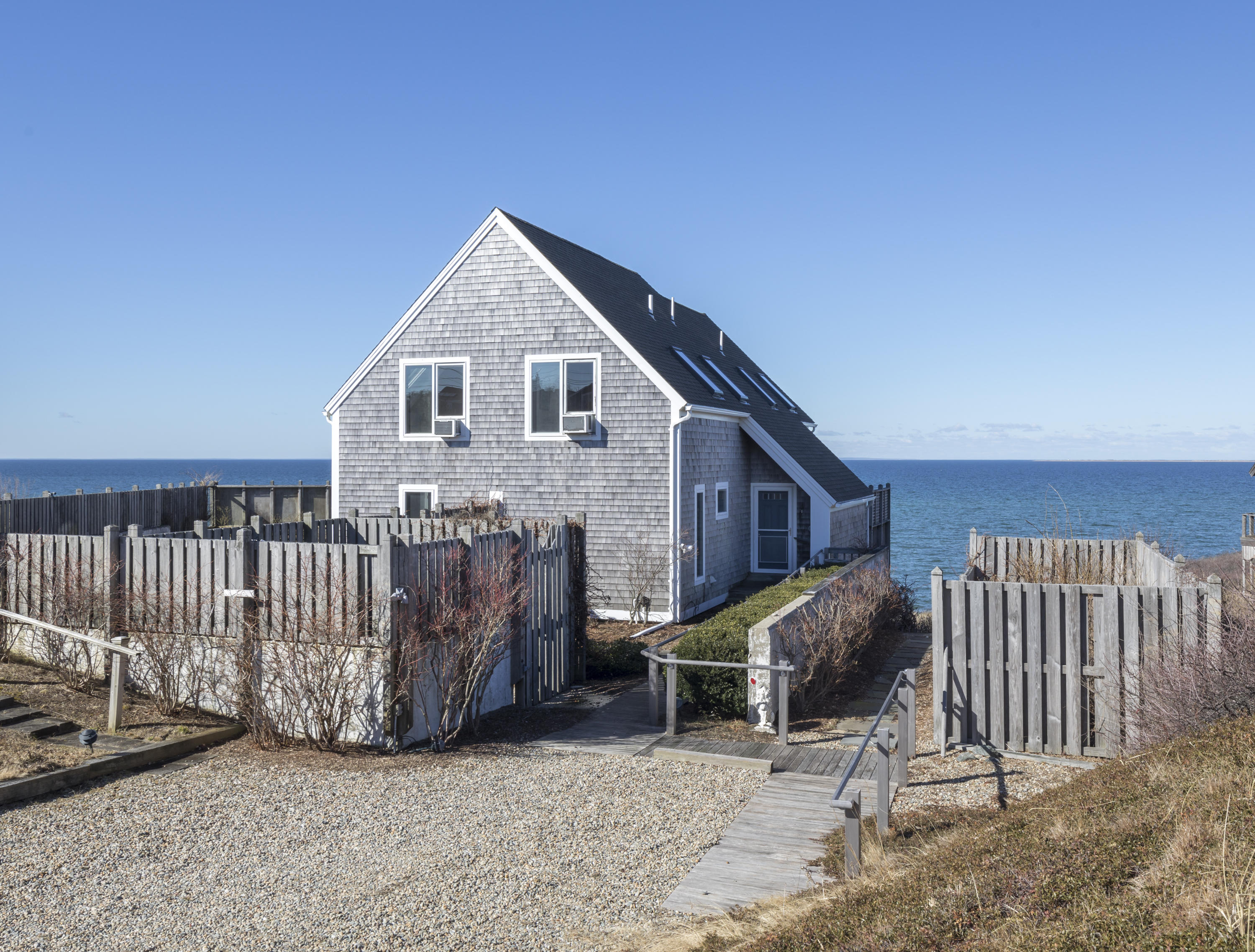 17 Bay View Road Truro, MA 02666 - Photo 5 of 40 a view of a house with wooden fence