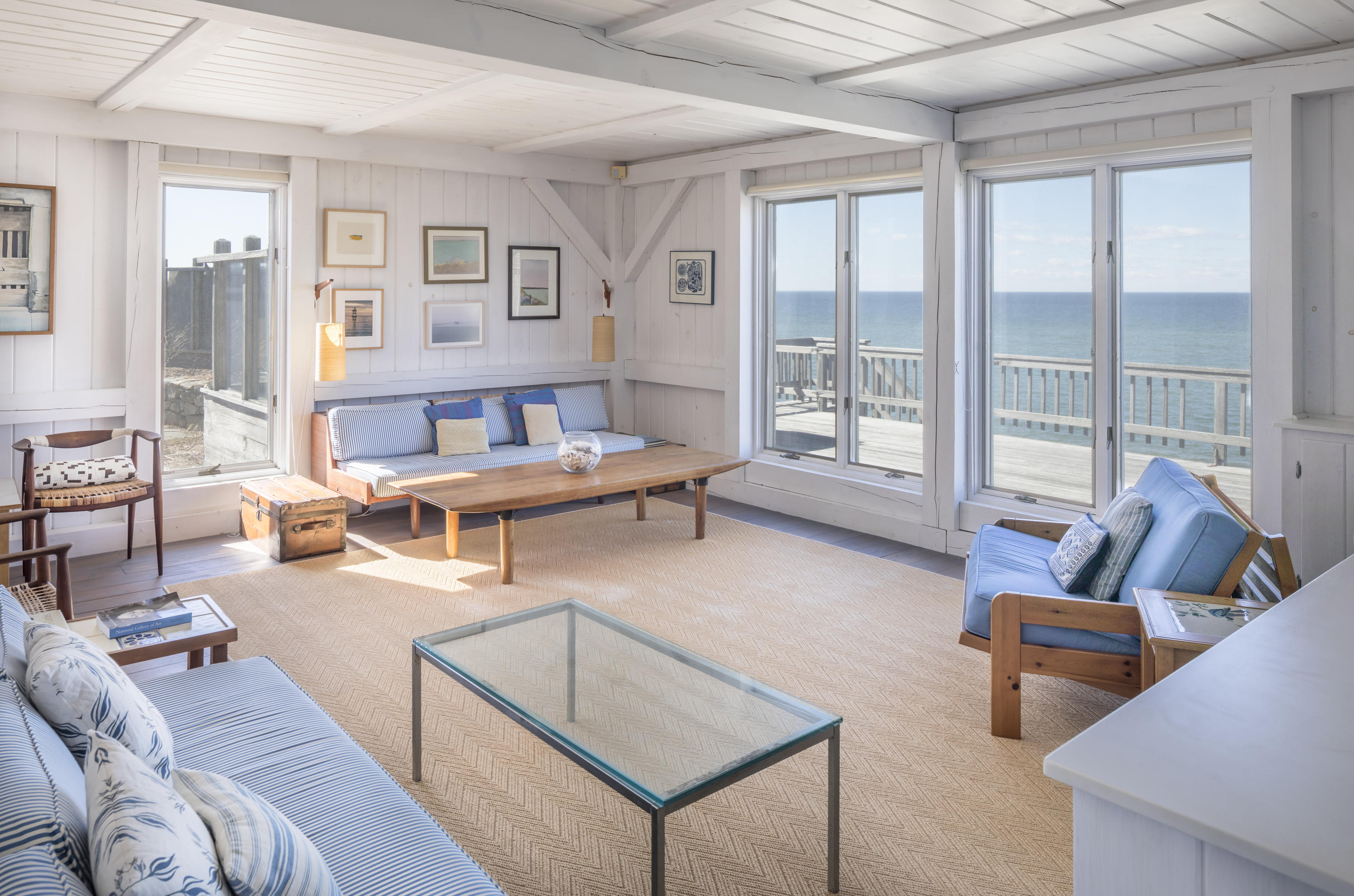 17 Bay View Road Truro, MA 02666 - Photo 10 of 40 a living room with furniture and floor to ceiling windows
