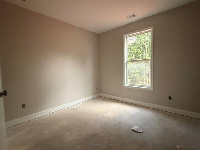 745 Mulberry Rock Road Temple, GA 30179 - Photo 10 of 33 an empty room with a window