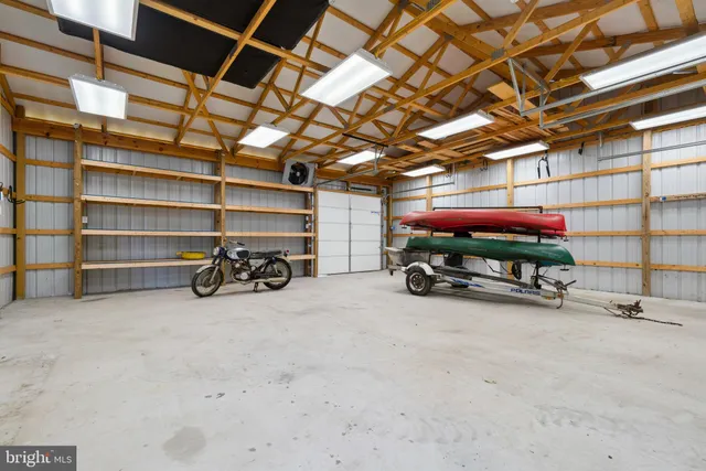 a view of parking garage with cars