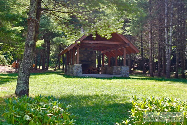 Lot 12 Camp Road Boone, NC 28607 - Photo 5 of 10 a view of a house with backyard and sitting area