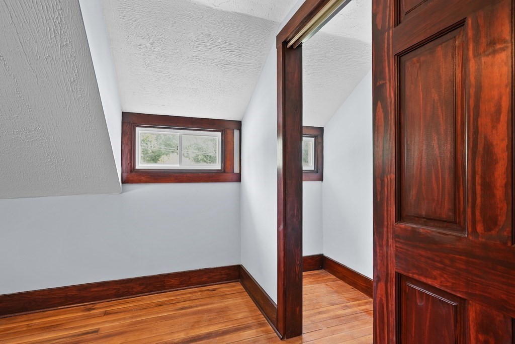 780 Williams Street Dighton, MA 02764 - Photo 29 of 39 a view of an empty room with wooden floor and a window