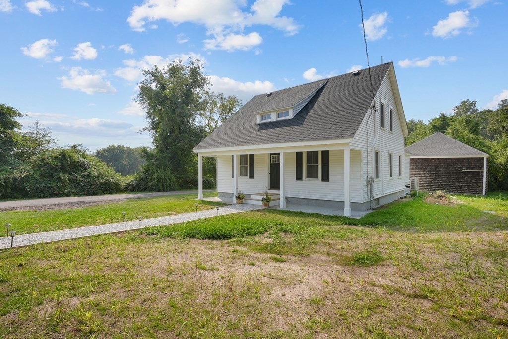 780 Williams Street Dighton, MA 02764 - Photo 3 of 39 a view of a house with backyard and sitting area
