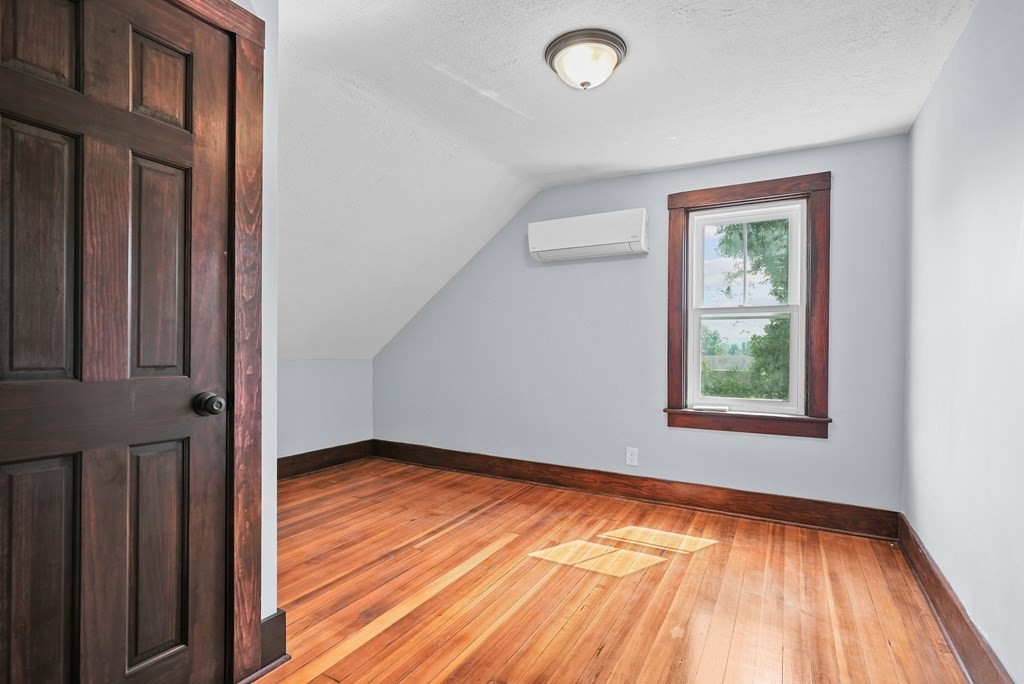 780 Williams Street Dighton, MA 02764 - Photo 31 of 39 an empty room with wooden floor and windows