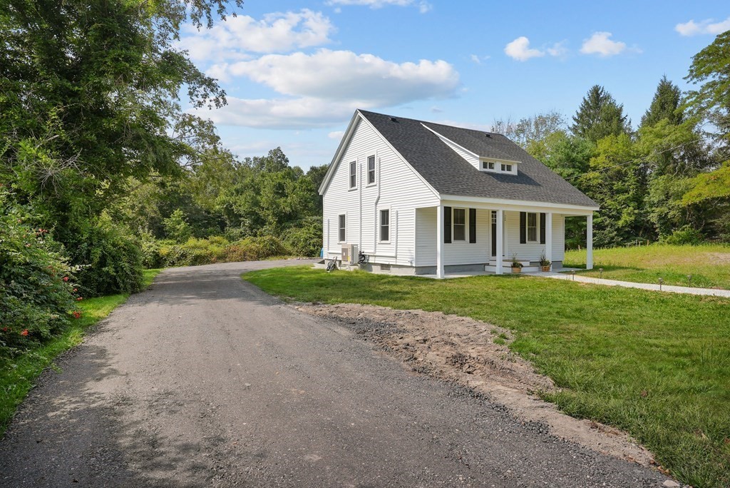780 Williams Street Dighton, MA 02764 - Photo 4 of 39 a front view of a house with a yard