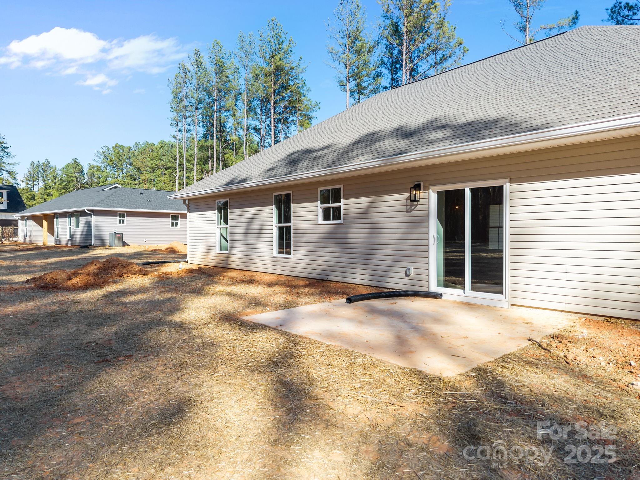 2307 Lee Lawing Road Lincolnton, NC 28092 - Photo 32 of 40 a front view of a house with a garage