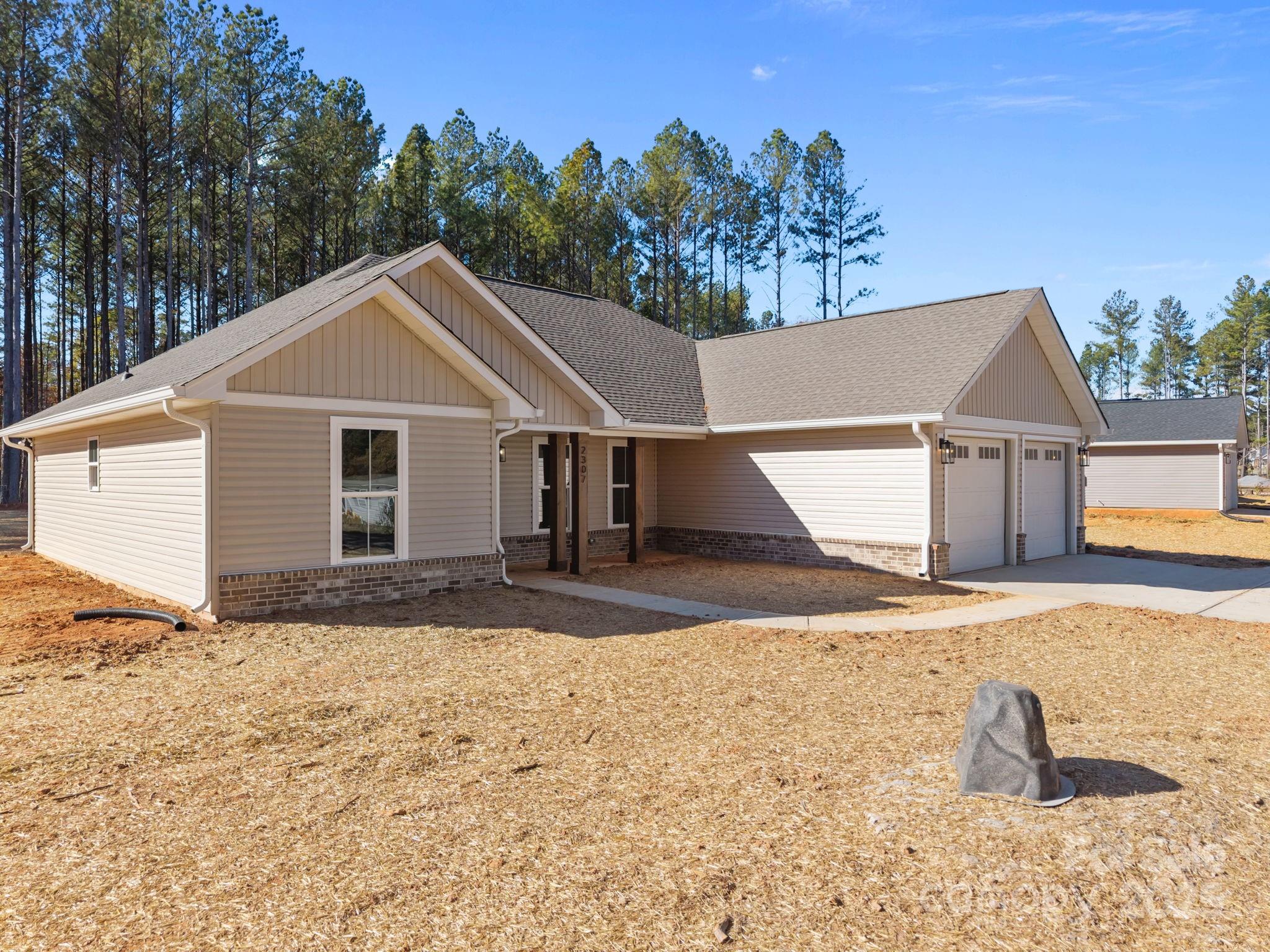 2307 Lee Lawing Road Lincolnton, NC 28092 - Photo 4 of 40 a view of a yard in front of a house