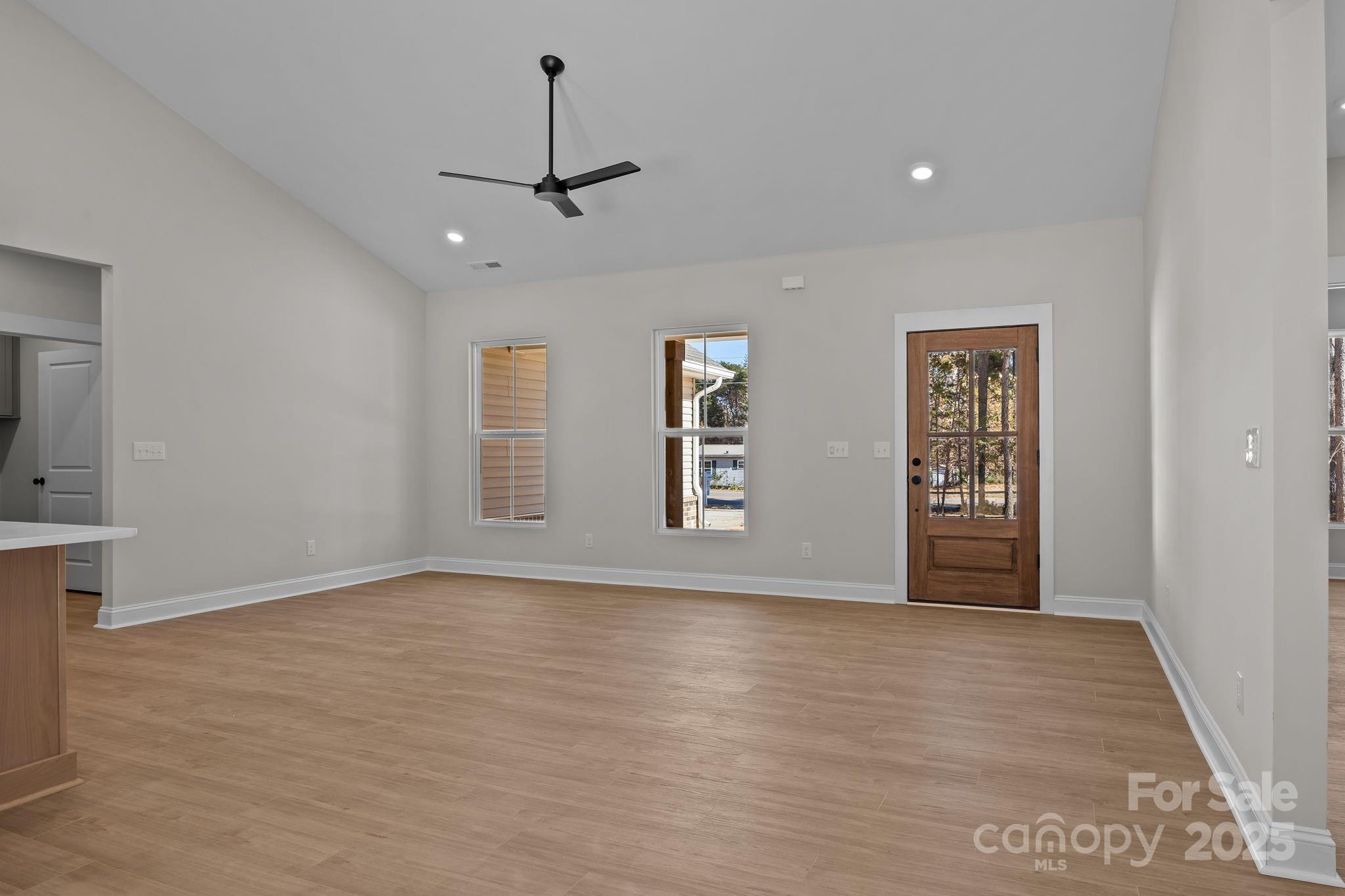 2307 Lee Lawing Road Lincolnton, NC 28092 - Photo 10 of 40 wooden floor in an empty room with a window