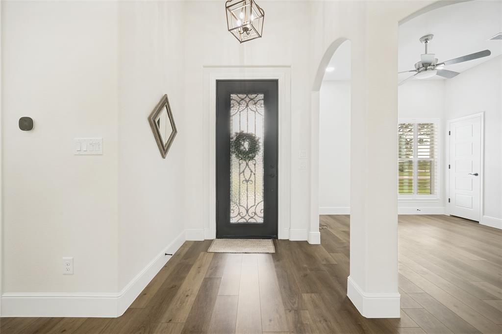 444 Ben Boyd Road Argyle, TX 76226 - Photo 4 of 28 a view of an entryway with wooden floor