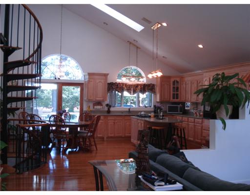 615 Camp Dixie Road Burrillville, RI 02859 - Photo 5 of 13 Kitchen. Spectacular new kitchen, center island, plenty of counter space and cabinetry, valuted ceilings, skylights, french doors lead to tiered deck overlooking the lake!