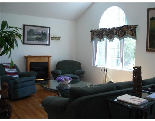 615 Camp Dixie Road Burrillville, RI 02859 - Photo 13 of 13 Living Room. Great Open Floor Plan, Hardwoods throughout, vaulted ceilings, gas fireplace, spectacular view of lake!