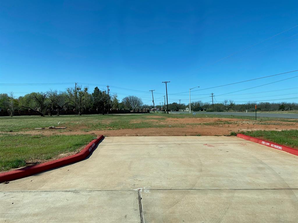 6890 Buffalo Gap Road Abilene, TX 79606 - Photo 10 of 10 a view of a lake with houses in background