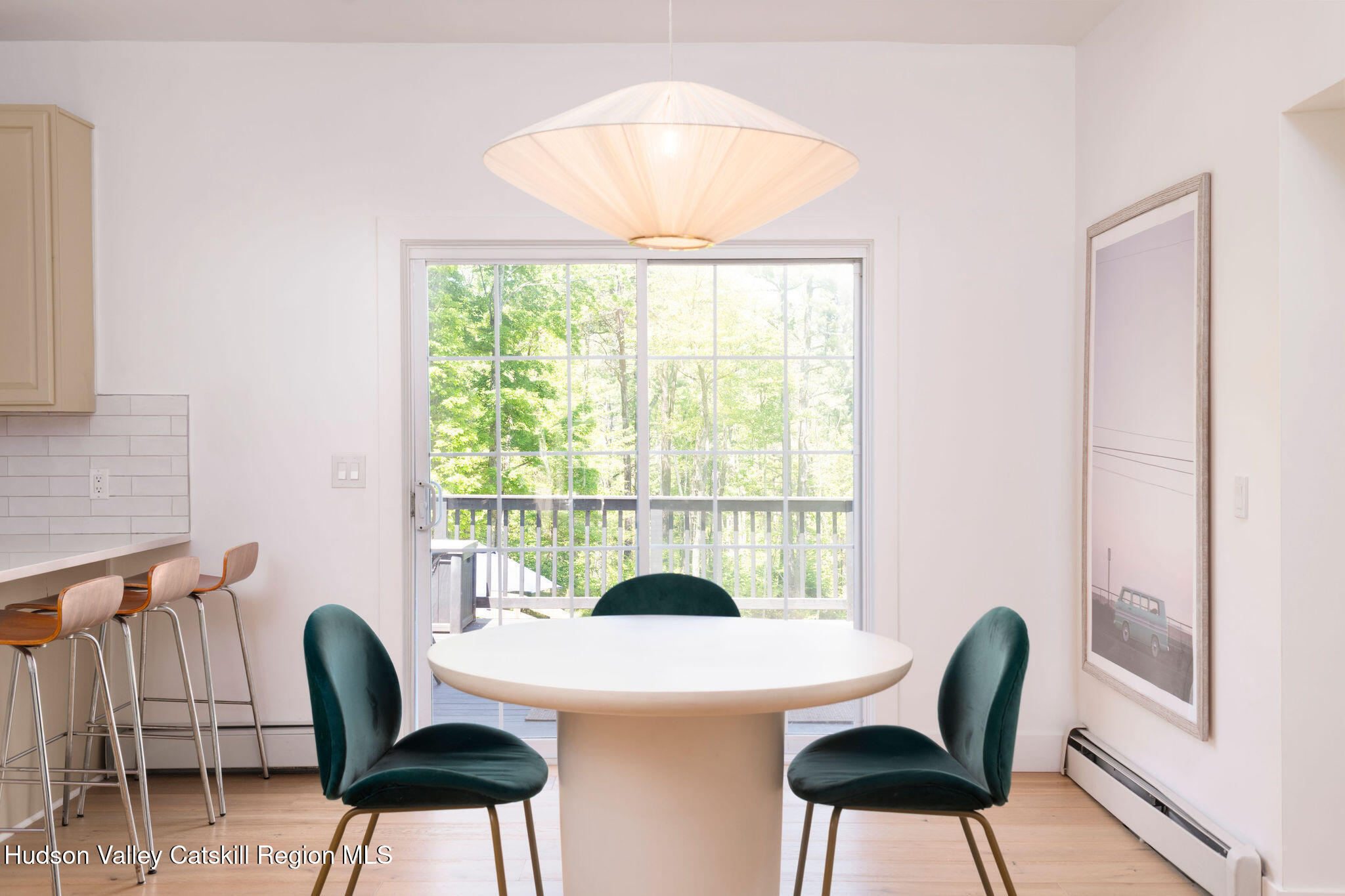 31 Laurel Hollow Road Kerhonkson, NY 12446 - Photo 12 of 47 a view of a dining room with furniture and a large window