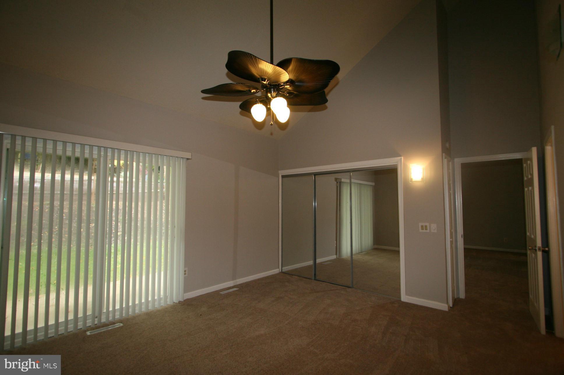 5313 Lightning View Road Columbia, MD 21045 - Photo 14 of 23 1st floor Master with slider to back patio